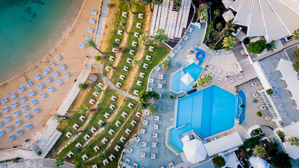 The Golden Coast Beach Hotel - Featured Image