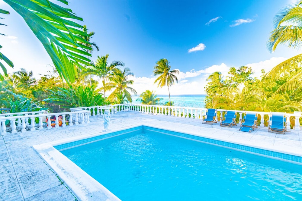Parrot Cottage at Love Beach Pool - Featured Image
